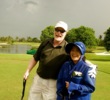 Golfer and Thai caddie