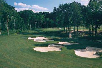 Tamahka Trails' No. 7 is a tough dogleg-right par 4 that requires a drive over bunkers.