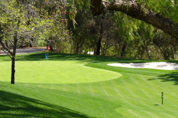 Hit a short game practice area, like this one at Industry Hills GC, to work on your chipping.