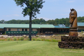 From the clubhouse, you can see the first tee and a huge wooden carving of the Gambit's signature knight.