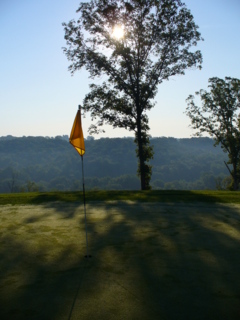 The green of the 11th hole at Stone Creek Golf Club overlooks the Shawnee National Forest.