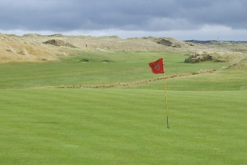 The weather can be unpredictable at links courses like Enniscrone, so it's good to always keep your waterproofs and umbrella handy.