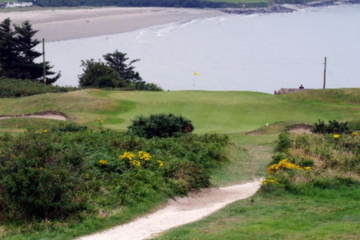 Cardigan Golf Club's par-3 16th hole highlights a strong finish on Wales' southwest coast.