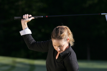For more power, try this drill: Swing to the top of your swing and pump your arms down half way, so that your right elbow points away from your body. 