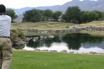 The 17th island green at PGA West TPC Stadium is just one of several inventively difficult holes Dye throws at you.