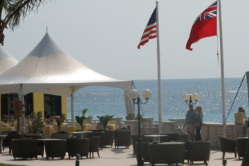 You can eat virtually on the sand at Elbow Beach.
