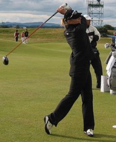 During Annika Sorenstam's swing, she turns her head through the hitting zone to allow her weight to swing toward the target.