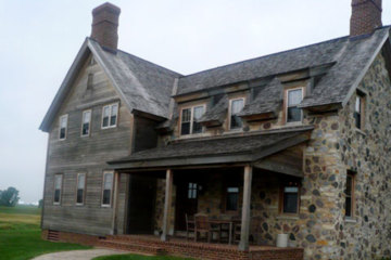 Erin Hills Golf Course's charming clubhouse looks like an old stone inn, and you can stay in it overnight, too.