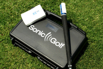 The Sonic Golf System-1 includes a transmitter, receiver, earphones, special grips and a carrying case.