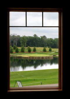From the Northern Bay Golf Resort clubhouse window, you can see the island green of the 17th hole at TPC Sawgrass.