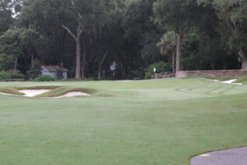 The first green on Dataw Island's Cotton Dike golf course has a couple of nasty bunkers front left.