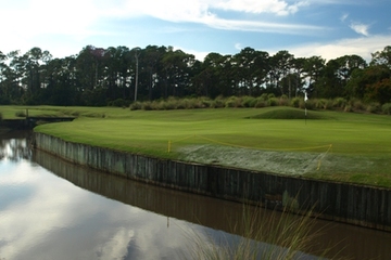 The eighth hole on Grand Cypress Resort's New Course is a long tricky par 4 with an approach that plays over a bern.