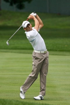 Developing a proper follow-through is an essential part of fixing your slice. Sergio Garcia holds his follow-through position until the ball comes to rest.