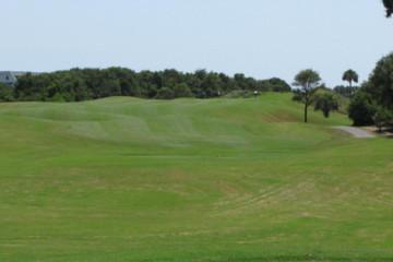 The 10th fairway on the Links Course at Wild Dunes Resort is a riot of mounds, ensuring an uneven lie and a likely blind approach shot.