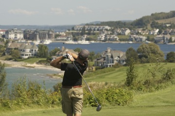 One should always swing the clubhead up and down through the golf ball along the target line to the pin.