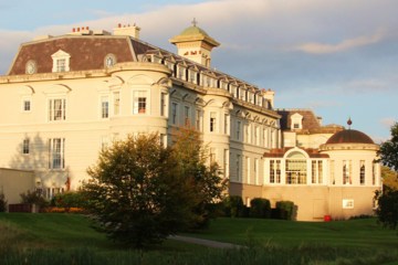 The Kildare Hotel, Spa & Country Club -- the elegant resort also known as The K Club -- shimmers in the setting sun.  