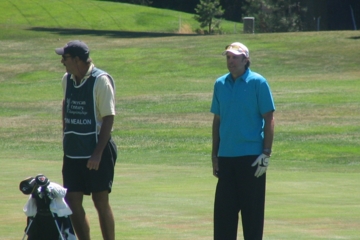 Kevin Nealon sizes up a shot, perhaps ready to "pump you up"